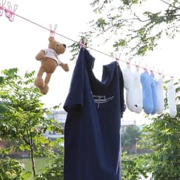 Portable Clothesline - 1 Pack Travel Clothesline - Adjustable Retractable Windproof Rope with 12 Thread Clips and Non-slip Buckle for Camping Travel Clothes Tumble Drying - Black — thumbnail 4