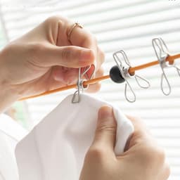 Kledinglijn Outdoor - Waslijn Draagbaar - Drogen Buiten - Inclusief Hangers - 10 Meter Lang - Gekleurd — thumbnail 3