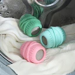 Set van 3 wasmachinereinigingsballen - Siliconen reinigingsballen voor de wasmachine - Wasmachineschrobballen - Herbruikbare droogballen - 7 * 4,5 cm - Geschikt voor het onderhoud van huishoudelijke wasmachines - Lichtblauw + Groen + Roze — thumbnail 2