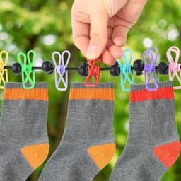 1 Stuk - Draagbare waslijn - Uitschuifbare waslijn - Waslijn met 12 gekleurde wasknijpers - Elastische reiswaslijn - Campingwaslijn met antislipkralen - Geschikt voor drogen binnenshuis, kamperen en reizen — thumbnail 4