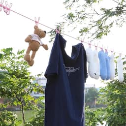 Portable Clothesline - 1 Pack Travel Clothesline - Adjustable Retractable Windproof Rope with 12 Thread Clips and Non-slip Buckle for Camping Travel Clothes Tumble Drying - Black — thumbnail 2