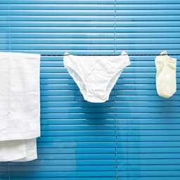 Waslijn voor reizen - Uittrekbaar touw - Kleding drogen - Montage zonder boren - 250 cm - Zwart — thumbnail 2