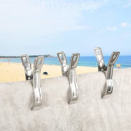 6 extra grote roestvrijstalen strandhanddoekclips - winddichte metalen wasknijpers voor ligbedden en zwembadstoelen - jumbo strandharingen voor handdoeken en lakens — thumbnail 2